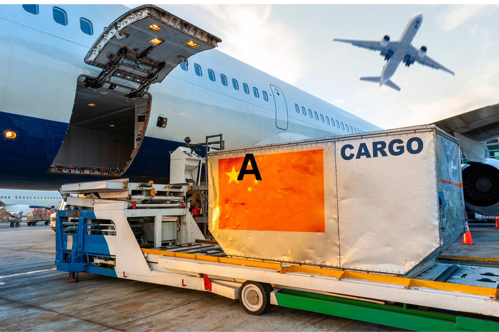 Cargo aircraft on the ramp with open hold as a ULD container is loaded; another plane taking off in the background